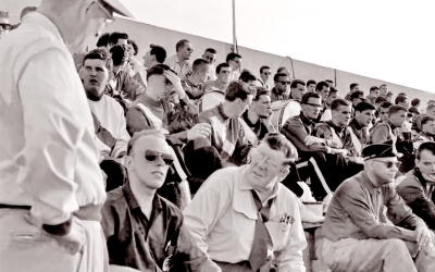 Members of the Optimists in the stands (Rochester, 1960)
Photo by Don Daber

L-R: Row 1: Clare Reid, bus driver, Glenn Copp's father

Row 2: Mike Layton, (? Guard member), Len Perrin, Ivor Bramley,
Mel Dey, Al Punkari, Bob Owen, Bill Thorne, Bob Brown,(?), Al Miller

Row 3: Al Morrison & Joe Gianna (talking to spectator behind),
Glenn Copp, Glen Durish, Doug McPhail, Hector Roberts, Gord O'Halloran,
Bill Ukas?, (?), (?), (?), Dennis DiCarli, Henry Beben
Keywords: 1960